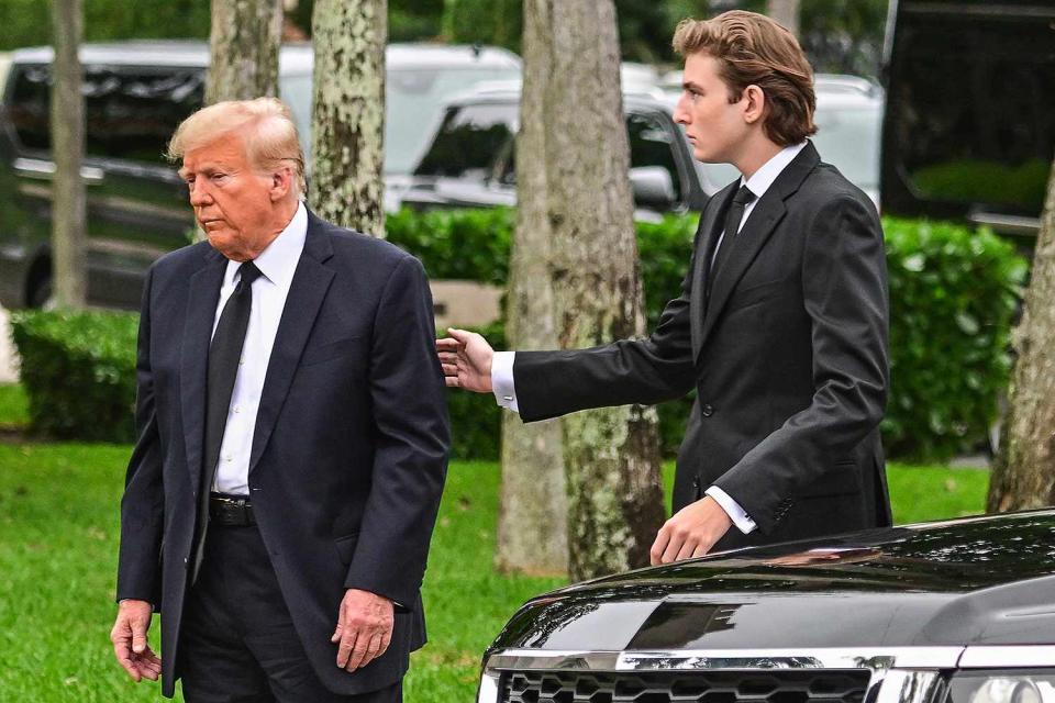 <p>GIORGIO VIERA/AFP via Getty Images</p> Donald Trump (left) and his son Barron Trump