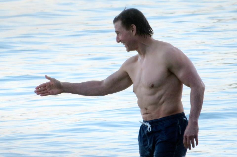 Cruise goes for a shirtless dip in the town of Pollensa. Joan Llado / GTres / SplashNews.com