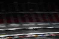 NASCAR Cup Series driver Aric Almirola (10) participates in a qualifying round ahead of a NASCAR exhibition auto race at Los Angeles Memorial Coliseum, Saturday, Feb. 4, 2023, in Los Angeles. (AP Photo/Ashley Landis)