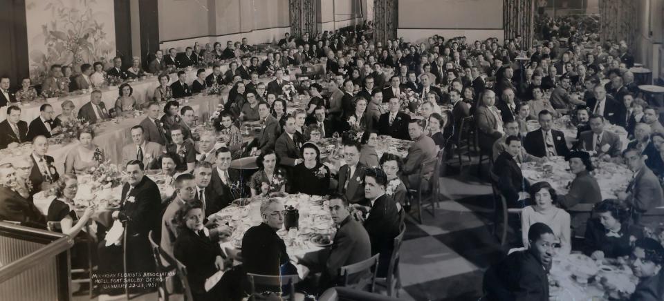 Ed Brazelton and his wife, Elizabeth Brazelton, seen in the lower right corner, at a banquet for the Michigan Florist Association held in Detroit in January of 1951. Brazelton was the first African American florist to join the organization. Alice Brazelton-Pittman, the owner of a floral company, took over the business from her father who started it in the 1940s in the same location a house on West Grand Boulevard near the Motown Museum.