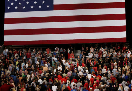 Supporters of U.S. President Donald Trump attend a rally in Springfield, Missouri, September 21, 2018. Picture taken September 21, 2018. REUTERS/Mike Segar