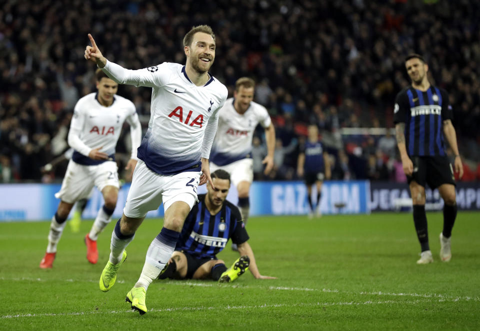 Tottenham midfielder Christian Eriksen celebrates after scoring his side's first goal during a Champions League group B soccer match between Tottenham Hotspur and Inter Milan at Wembley stadium in London, Wednesday, Nov. 28, 2018. (AP Photo/Matt Dunham)