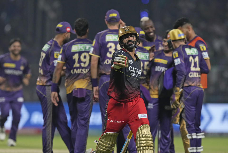 Royal Challengers Bangalore's Dinesh Karthik leaves the field after being dismissed during the Indian Premier League (IPL) cricket match between Royal Challengers Bangalore and Kolkata Knight Riders in Kolkata, India, Thursday, April 6, 2023. (AP Photo/Bikas Das)