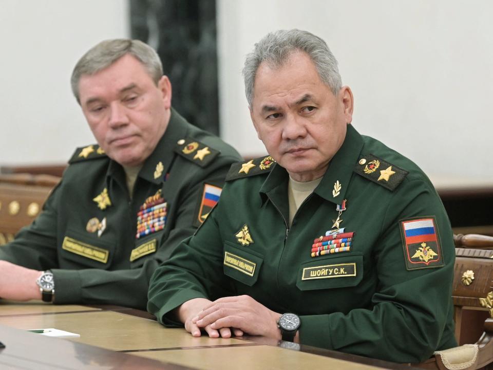 Russian Defence Minister Sergei Shoigu (R) and chief of the general staff Valery Gerasimov attend a meeting with Russian President in Moscow on February 27, 2022.