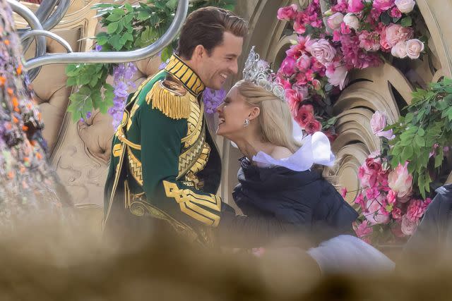 Bav Media / Shutterstock "Wicked" costars Jonathan Bailey and Ariana Grande laugh together in costume on the film's U.K.-based set.