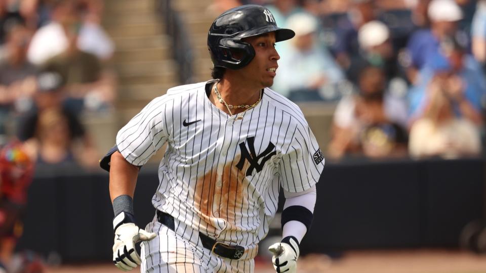 Mar 10, 2024; Tampa, Florida, USA; New York Yankees infielder Oswaldo Cabrera (95) hits a single against the Atlanta Braves during the fifth inning at George M. Steinbrenner Field.