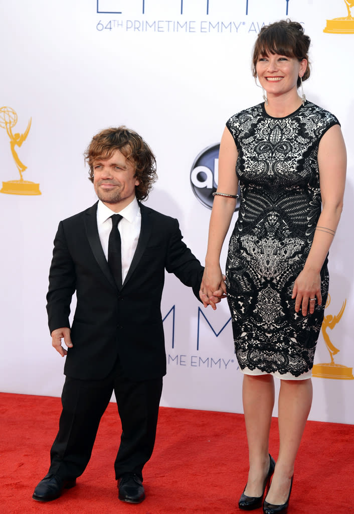 Peter Dinklage and Erica Schmidt at the 64th Primetime Emmy Awards at the Nokia Theatre in Los Angeles on September 23, 2012.