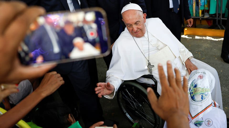 Pope Francis greets Catholic worshipers in Dili, East Timor, on September 10, 2024. - Willy Kurniawan/Reuters