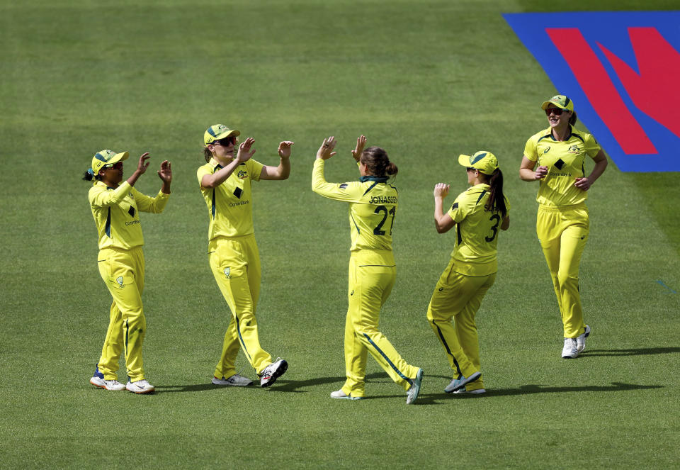 Australia's Annabel Sutherland, second left, celebrates with teammates after catching out England's Alice Capsey during the third one day international of the Women's Ashes Series between England and Australia at Cooper Associates County Ground, Taunton, England, Tuesday July 18, 2023. (Steven Paston/PA via AP)