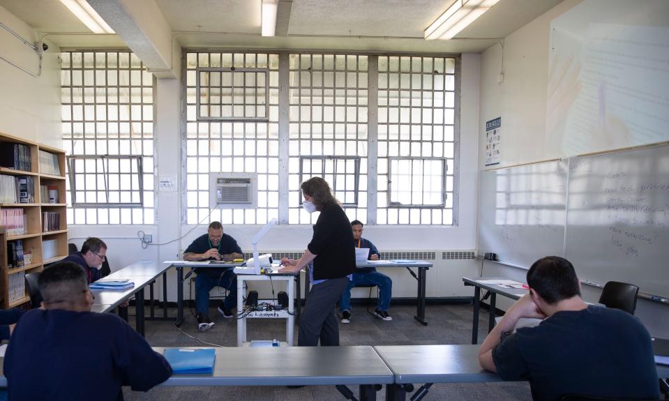 Instructor Heather Goldblatt teaches adults in custody during a class at Oregon State Correctional Institution in Salem, Ore., on Wednesday, May 25, 2022.