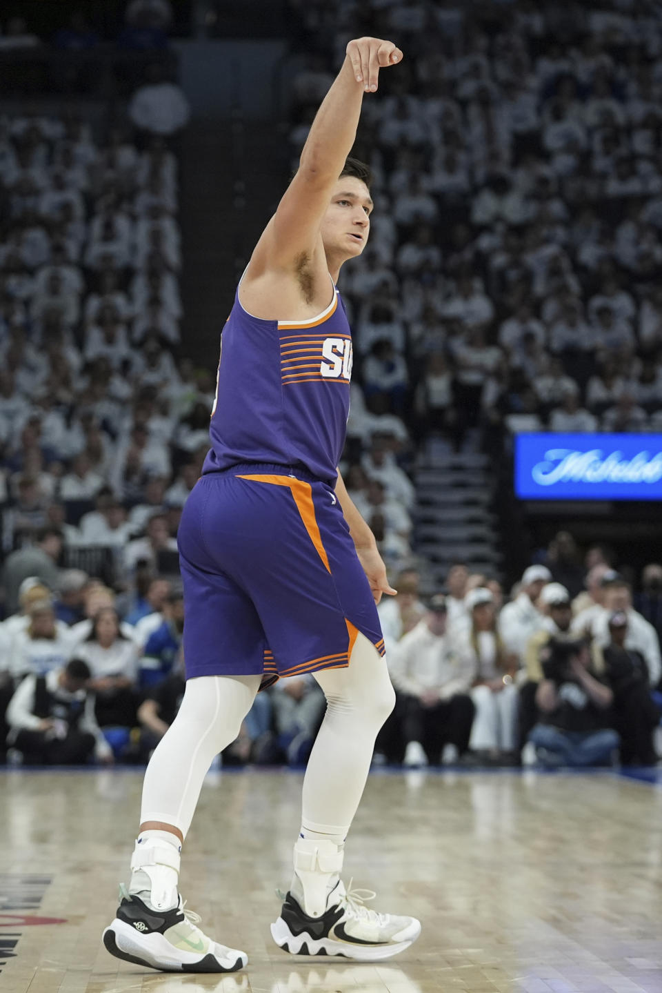 Phoenix Suns guard Grayson Allen stands on the court after missing a shot during the first half of Game 1 of an NBA basketball first-round playoff series against the Minnesota Timberwolves, Saturday, April 20, 2024, in Minneapolis. (AP Photo/Abbie Parr)