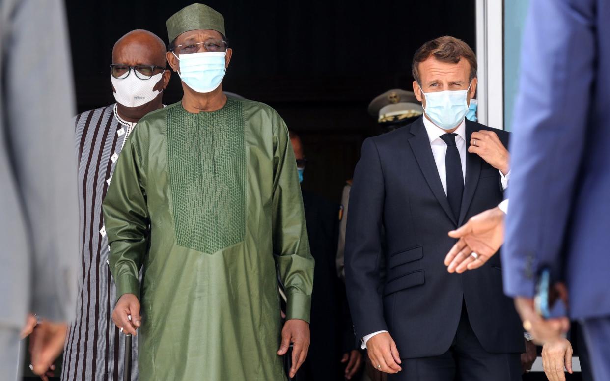 Burkina Faso President Roch Marc Christian Kabore , Chad President Idriss Deby and French President Emmanuel Macron arrive for the security summit on June 30  - Reuters