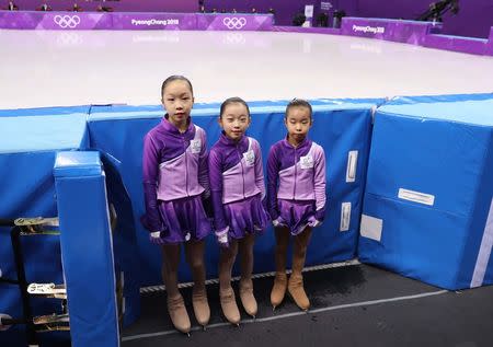 Ice girls, Kang Hae-bin (L-R), Oh Yu-jin and Youn Seo-jin are pictured at Gangneung Ice Arena during the Pyeongchang 2018 Winter Olympics in Pyeongchang, South Korea, February 20, 2018. REUTERS/Lucy Nicholson