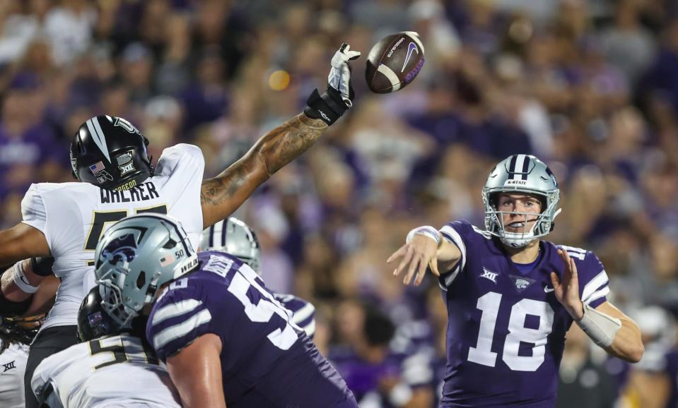 Kansas State quarterback Will Howard (18) has his pass blocked by Central Florida defensive tackle John Walker during the first half of an NCAA college football game on Saturday, Sept. 23, 2023, in Manhattan, Kan. (AP Photo/Travis Heying)