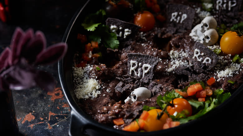 graveyard bean dip on table