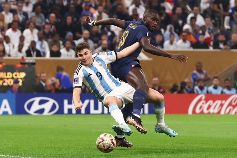 Julian Alvarez (L) of Argentina in action with Marcus Thuram of France during the 2022 FIFA World Cup Final at Lusail Stadium in Lusail City, Qatar in 2022. The final game of the 2026 World Cup will be played at MetLife Stadium in New Jersey. Photo by Chris Brunskill/UPI