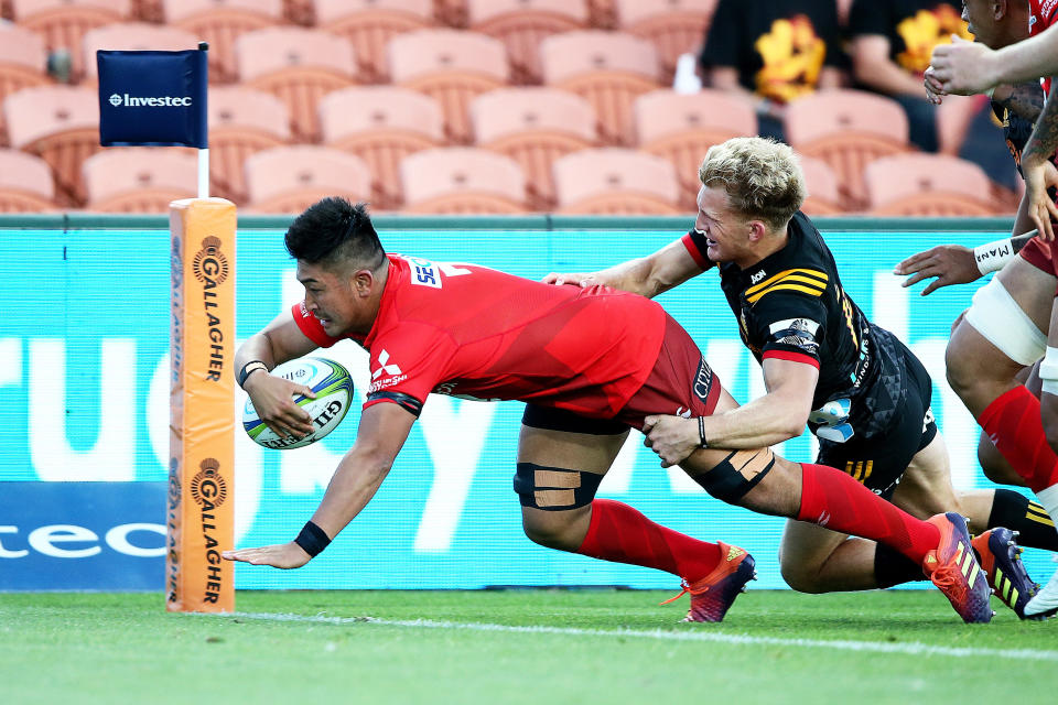 Sunwolves flanker Shuhei Matsuhashi scores the opening try during the Super Rugby match between the Sunwolves and the Chiefs in Hamilton, New Zealand, Saturday, March 2, 2019. (AP Photo/Bruce Lim)