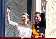 LUXEMBOURG - OCTOBER 20: Princess Stephanie of Luxembourg and Prince Guillaume of Luxembourg wave to the crowds from the balcony of the Grand-Ducal Palace following the wedding ceremony of Prince Guillaume Of Luxembourg and Princess Stephanie of Luxembourg at the Cathedral of our Lady of Luxembourg on October 20, 2012 in Luxembourg, Luxembourg. The 30-year-old hereditary Grand Duke of Luxembourg is the last hereditary Prince in Europe to get married, marrying his 28-year old Belgian Countess bride in a lavish 2-day ceremony. (Photo by Andreas Rentz/Getty Images)