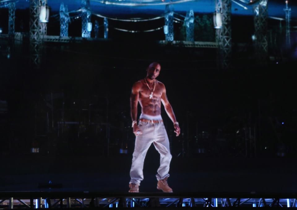 A hologram of deceased rapper Tupac Shakur performs onstage during day 3 of the 2012 Coachella Valley Music & Arts Festival at the Empire Polo Field on April 15, 2012 in Indio, California. (Getty)