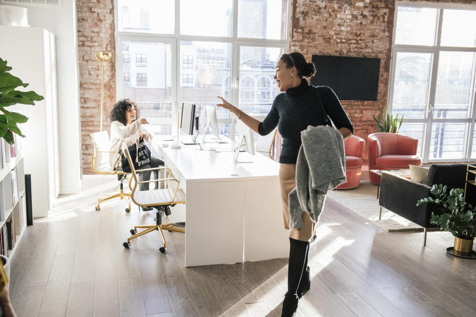 a woman leaving the office