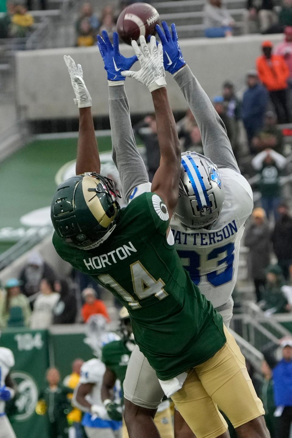 Sep 10, 2022; Fort Collins, Colorado, USA; Middle Tennessee Blue Raiders cornerback Decorian Patterson (33) makes a fourth quarter interception at Sonny Lubick Field at Canvas Stadium. Mandatory Credit: Michael Madrid-USA TODAY Sports