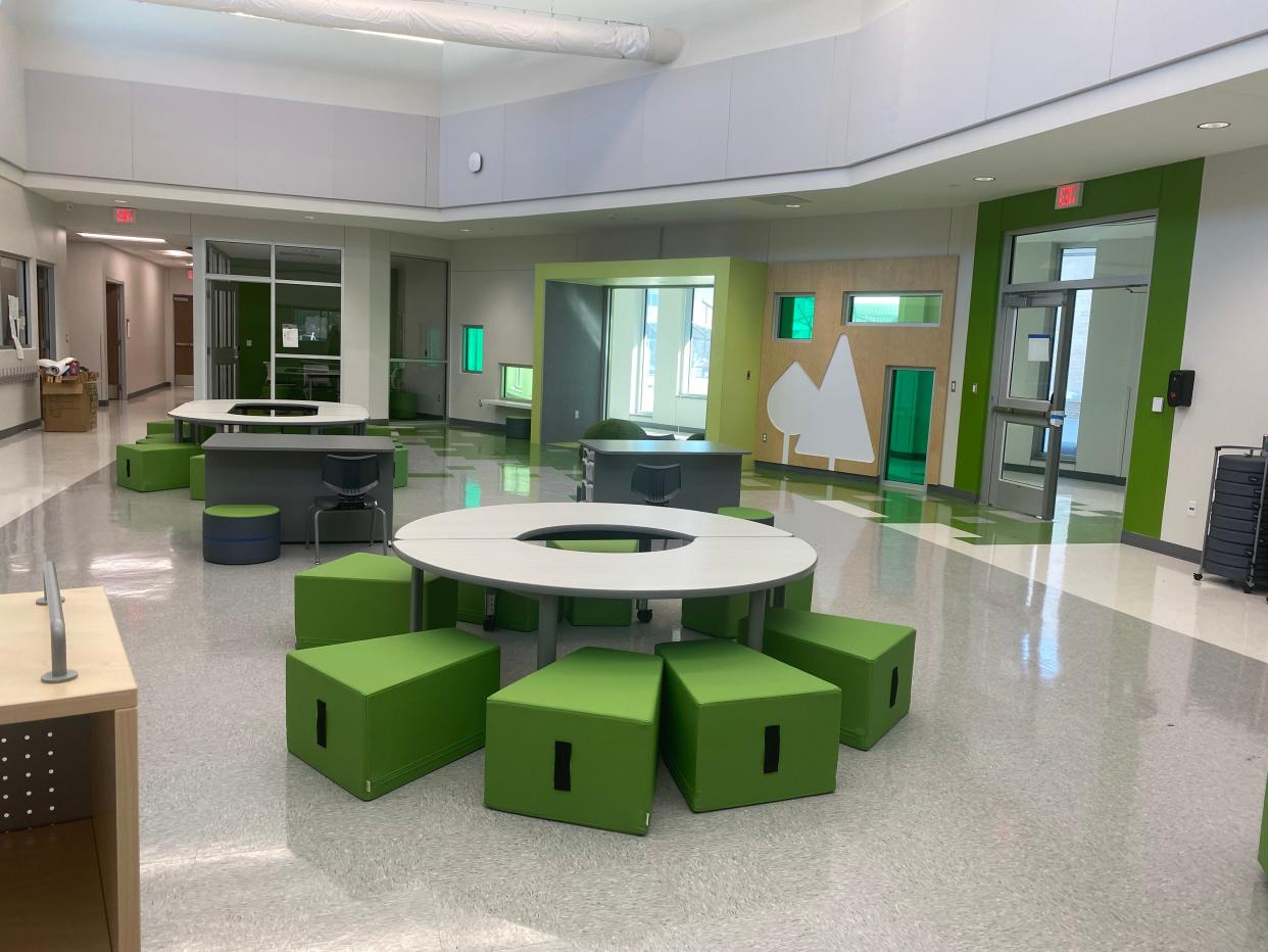 The new Gregory-Portland ISD Early Childhood Center is designed with six color-themed "neighborhoods" including a central multi-purpose room and six classrooms.