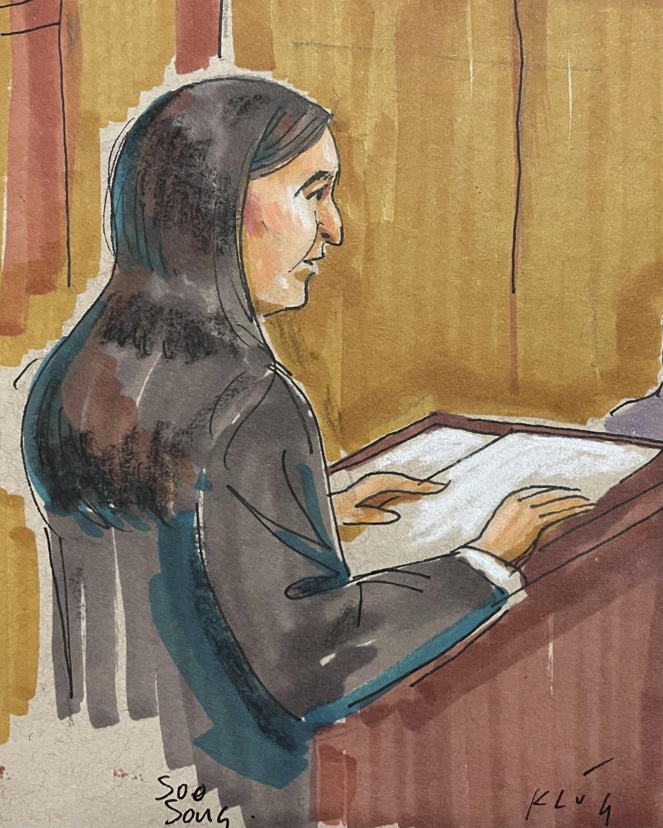 In this courtroom sketch, Assistant U.S. Attorney Soo C. Song delivers her opening statement in the federal trial for Robert Bowers, the suspect in the 2018 synagogue massacre, on Tuesday, May 30, 2023, in Pittsburgh. Bowers could face the death penalty if convicted of some of the 63 counts he faces in the shootings, which claimed the lives of worshippers from three congregations who were sharing the building, Dor Hadash, New Light and Tree of Life. (David Klug via AP)