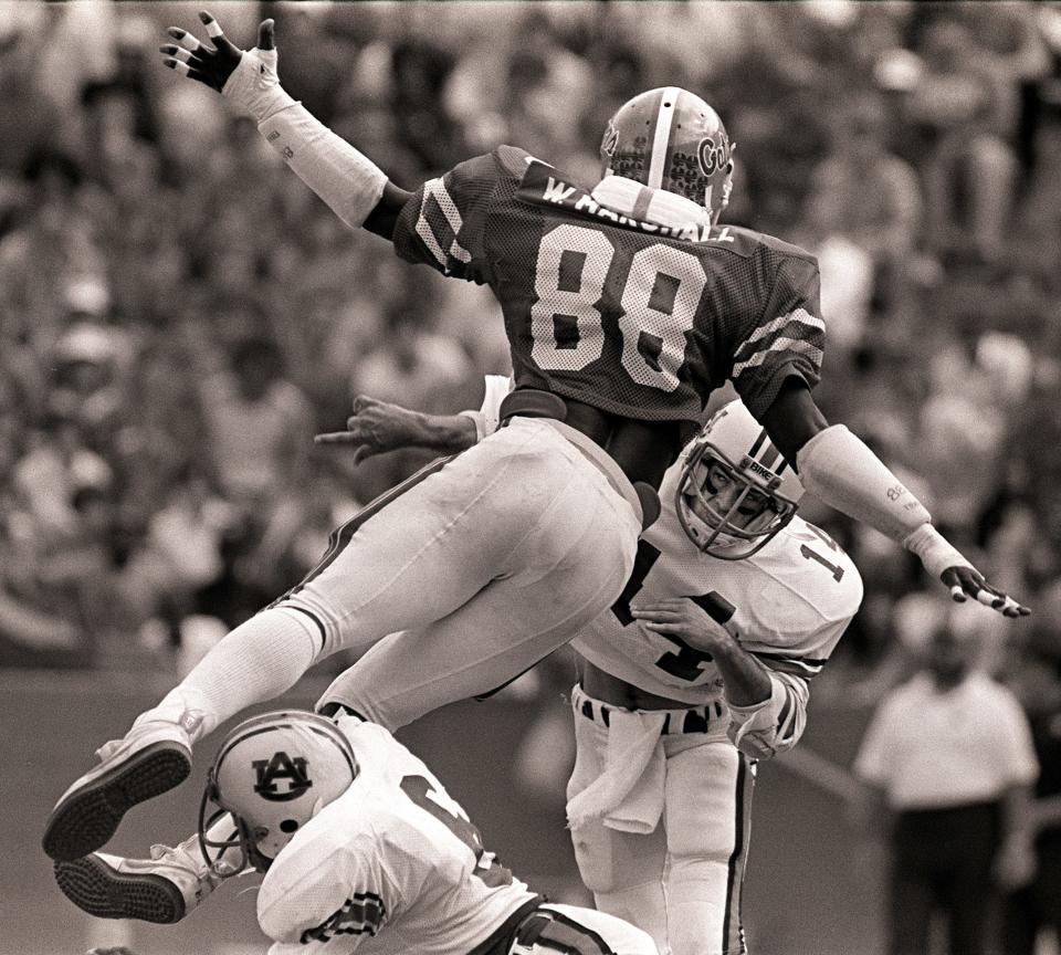 Astronaut graduate Wilber Marshall, a two-time consensus All-American and 1983 National Defensive Player of the Year at Florida, shown here in the 1982 Auburn game.