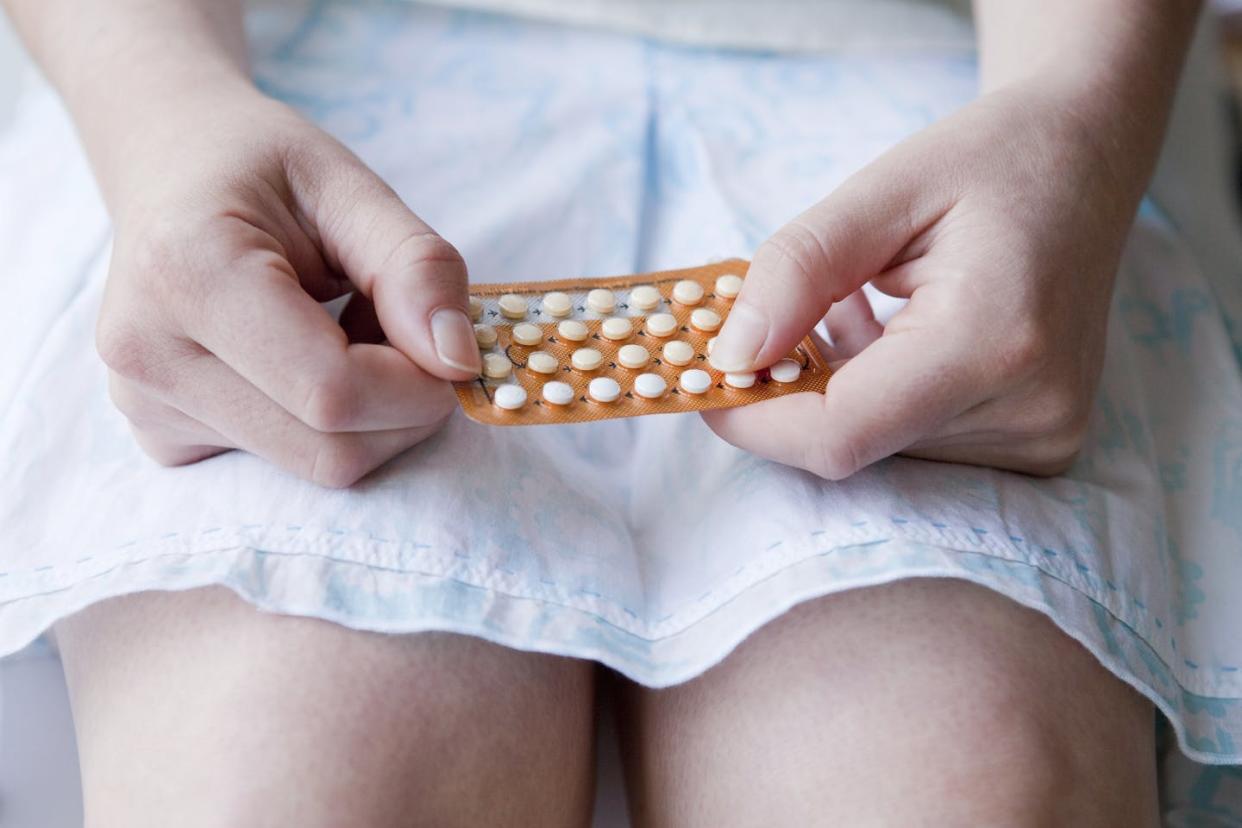 The Food and Drug Administration has approved the first nonprescription daily birth control pill. <a href="https://www.gettyimages.com/detail/photo/young-woman-holding-the-pill-on-her-lap-royalty-free-image/88186275?phrase=birth+control&adppopup=true" rel="nofollow noopener" target="_blank" data-ylk="slk:Dimitri Otis/Stone via Getty Images;elm:context_link;itc:0;sec:content-canvas" class="link ">Dimitri Otis/Stone via Getty Images</a>