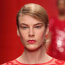 <b>Jasper Conran</b><br><br>Models sported pinky coral lipstick and matte skin on the catwalk.<br><br>Image © Getty