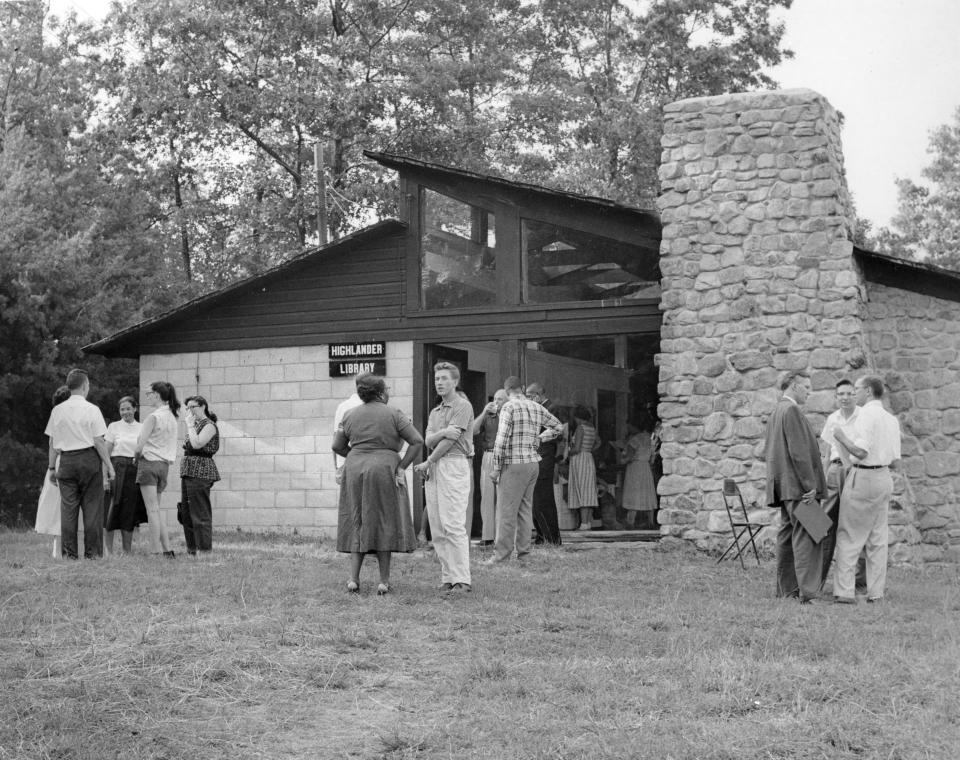 In this undated photo provided by the Nashville Banner Archives, Nashville Public Library, Special Collections, people meet at the Highlander Library in Monteagle, Tenn. The library building where Rosa Parks, John Lewis and other civil rights leaders forged strategies that would change the world is mired in controversy over who gets to tell its story. (Nashville Banner Archives, Nashville Public Library, Special Collections via AP)