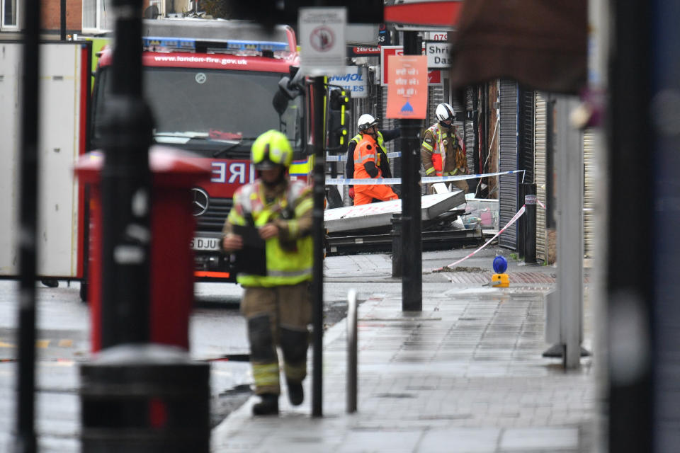 Emergency services at the scene of a suspected gas explosion on King Street in Ealing, west London. Rescuers are involved in a "complex" search for anyone who may still be inside the collapsed building.