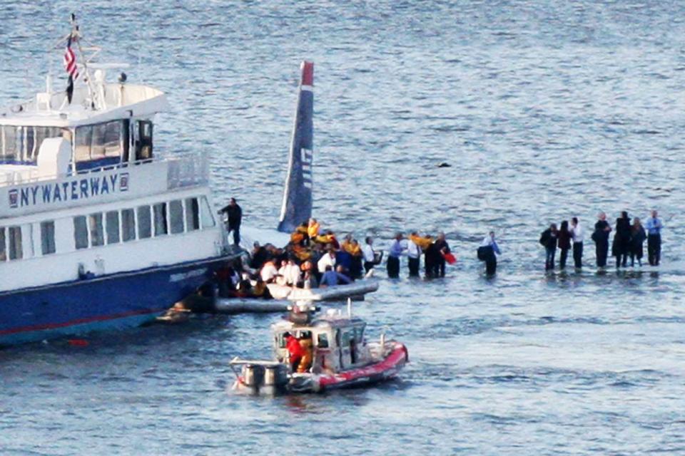 <p>Bebeto Matthews/AP</p> Passengers in an inflatable raft prepare to move away from an Airbus 320 US Airways aircraft that has gone down in the Hudson River in New York, Thursday Jan. 15, 2009.