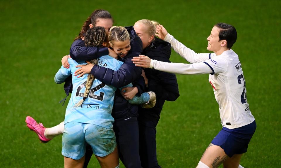 <span>Becky Spencer celebrates with Tottenham teammates following the penalty shootout win.</span><span>Photograph: Alex Davidson/Getty Images</span>