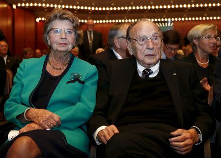 Former German foreign minister Hans-Dietrich Genscher and his wife Barbara attend a ceremony in the 'Alte Oper' in Frankfurt, Germany, in this file picture taken October 3, 2015. REUTERS/Ralph Orlowski/Files