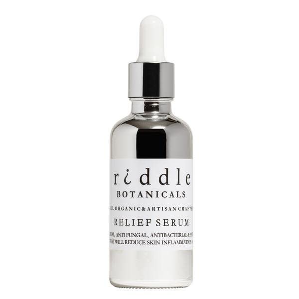 Riddle Botanicals' Relief Serum contains tea tree oil (this beauty writer's favorite cure-all), clary sage oil, juniper berry oil and lavender oil, all of which have been said to be great for acne-prone skin. if you (like me) deal with hormonal breakouts, this oil is especially good. It's a super lightweight formula that doesn't leave skin feeling greasy and, thanks to the combination of essential oils, has a relaxation-inducing smell.&nbsp;<br /><br /><strong><a href="https://riddleoil.com/collections/riddle-botanicals/products/botanicals-relief-serum" target="_blank">Riddle Botanicals Relief Serum</a>, $35</strong>