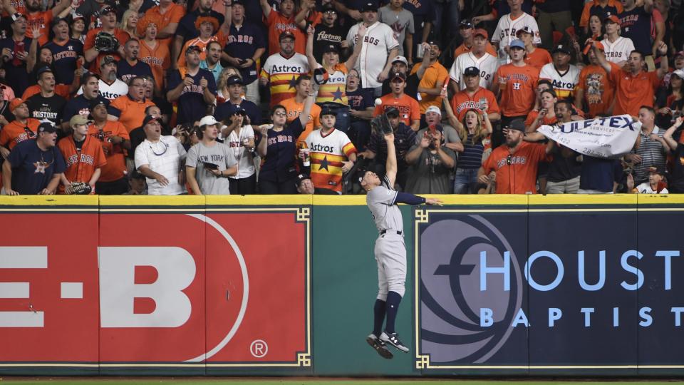 New York Yankees’ Aaron Judge catches a long fly ball hit by Houston Astros’ Yuli Gurriel during the second inning of Game 7 of baseball’s American League Championship Series Saturday, Oct. 21, 2017, in Houston. (AP Photo/Eric Christian Smith)