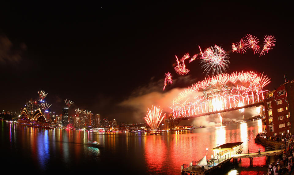 SYDNEY, AUSTRALIA - JANUARY 01: Fireworks light up the skyline over Sydney Harbour during the midnight fireworks session as Sydney Celebrates New Year's Eve with the theme of 'Time To Dream' on January 1, 2012 in Sydney, Australia. (Photo by Ryan Pierse/Getty Images)