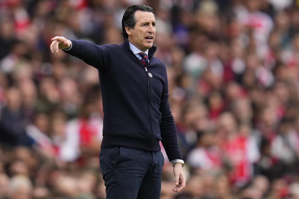 Aston Villa's head coach Unai Emery gestures during the English Premier League soccer match between Arsenal and Aston Villa at the Emirates stadium in London, Sunday, April 14, 2024. (AP Photo/Kirsty Wigglesworth)