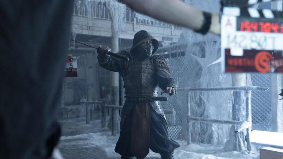 A fighter wields a sword in Mortal Kombat