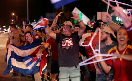 People celebrate after the announcement of the death of Cuban revolutionary leader Fidel Castro, in the Little Havana district of Miami, Florida, U.S. November 26, 2016. REUTERS/Javier Galeano