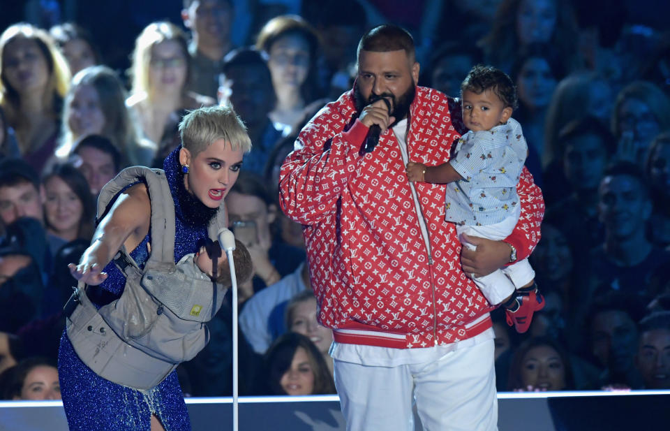 Host Katy Perry (L) and DJ Khaled speak onstage during the 2017 MTV Video Music Awards at The Forum on Aug. 27, 2017 in Inglewood, California.&nbsp;