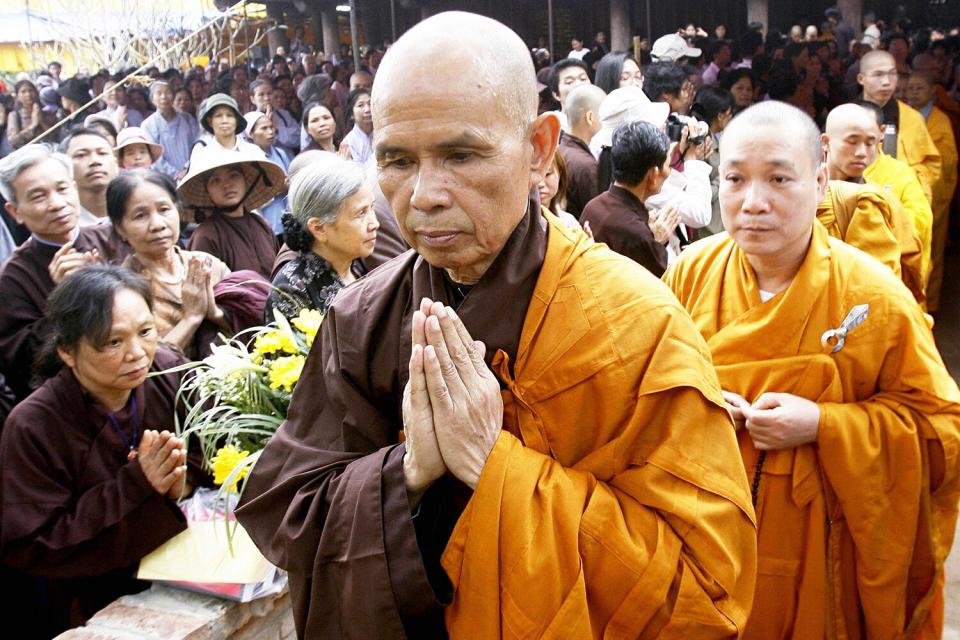 Zen Buddhist monk leader Thich Nhat Hanh (F) prays during a three-day requiem for the souls of Vietnam War victims held 20 April 2007 at a pagoda in Soc Son district, suburban Hanoi. The monk has held two others requiems in Southern and Central Vietnam.