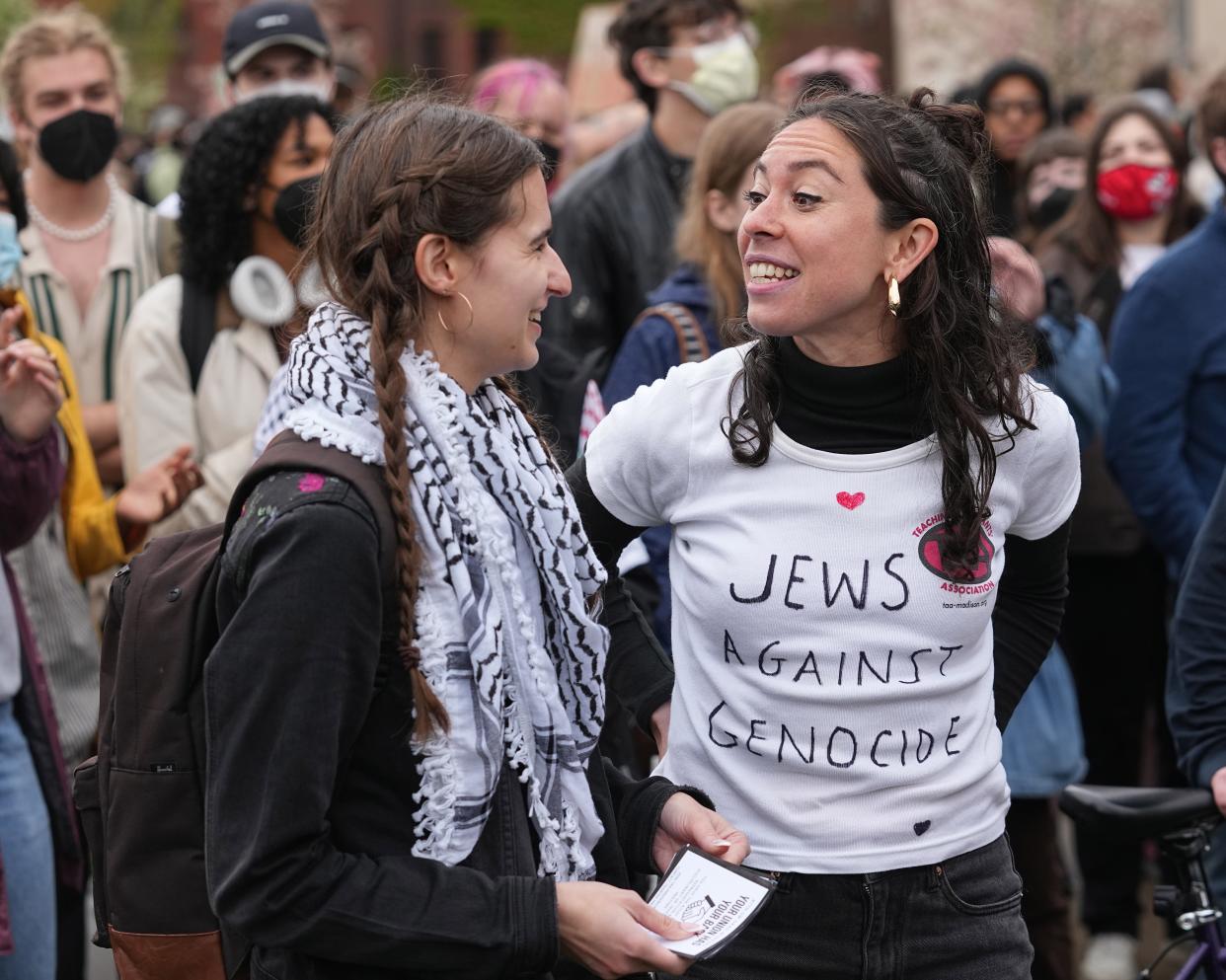 Demonstrators protest the Israel-Hamas war Monday, April 29, 2024 at the University of Wisconsin-Madison in Madison, Wisconsin. Student protesters around the country have demanded colleges cut financial ties to Israel. The latest demonstrations show growing discontent over their schools’ responses to the war in Gaza.