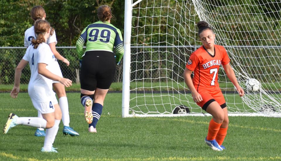 Diman's Cheyenne Brito turns towards her teammates after scoring a goal against Bristol-Plymouth