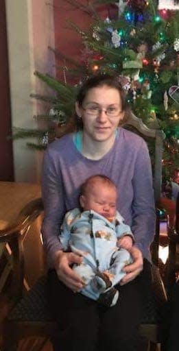 Heather Pingel, of Bowler, died from injuries she suffered while protecting her 4-year-old son from a dog attack Dec. 8 at the family's home. Here she is pictured with a cousin's baby.