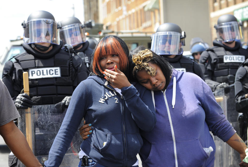Jerrie McKenny, left, can't hold back the tears as she gets a hug from her sister Tia Sexton while at a peaceful protest at North and Pennsylvania Avenues on Tuesday, April 28, 2015, in Baltimore, MD, USA. Photo by Lloyd Fox/Baltimore Sun/TNS/ABACAPRESS.COM
