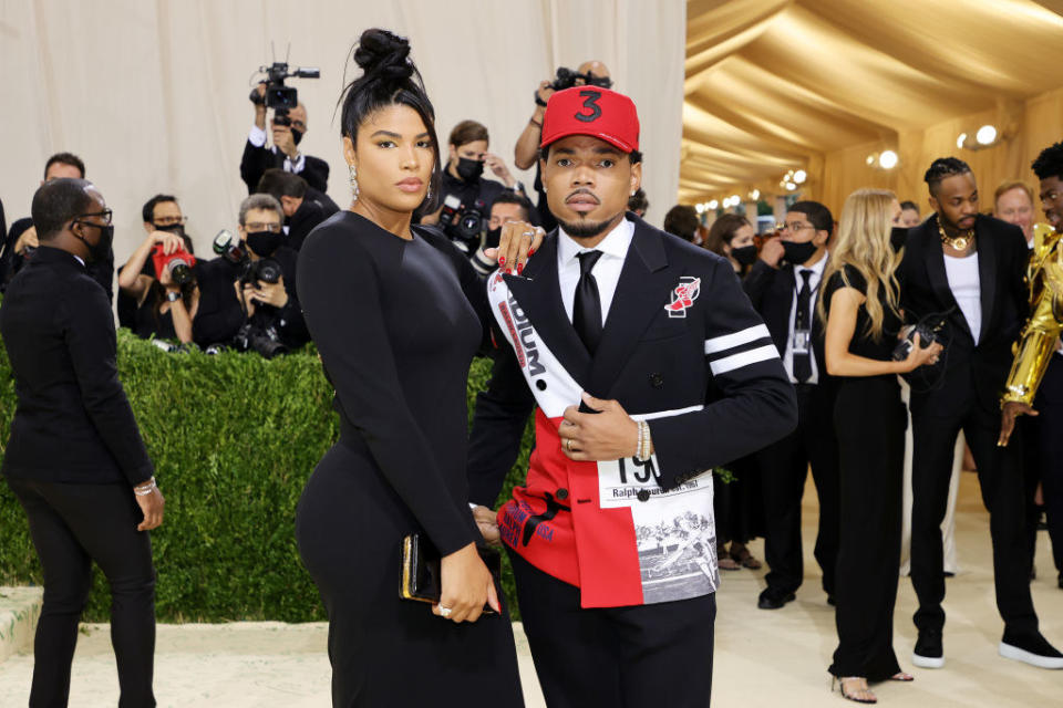 A close up of Kirsten Corley and Chance the Rapper as they pose on the red carpet of the Met Gala