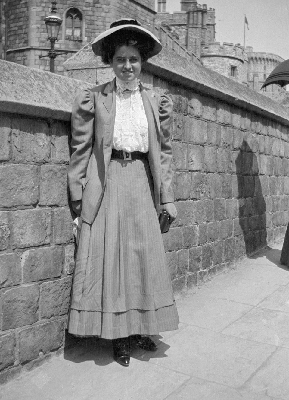 In this 1908 photo provided by the Kennedy Family Collection, courtesy of the John F. Kennedy Library Foundation, Rose Fitzgerald poses at Windsor Castle in Windsor, Berkshire, England. The Boston-based museum completed an 18-month project in 2018 to catalog and digitize more than 1,700 black-and-white Kennedy family snapshots that are viewable online, giving a nation still obsessed with "Camelot" a candid new glimpse into their everyday lives. (Kennedy Family Collection/John F. Kennedy Library Foundation via AP)