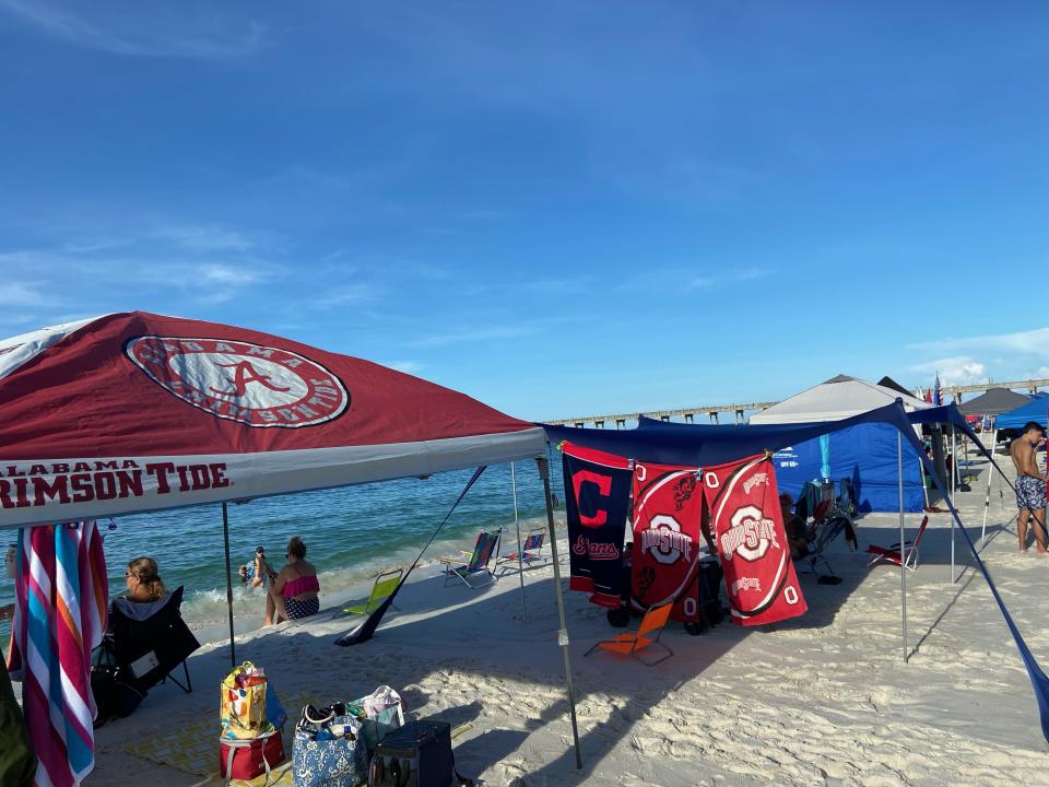 College loyalty is tested on Pensacola Beach during the Blue Angels show Friday, July 8, 2022.
